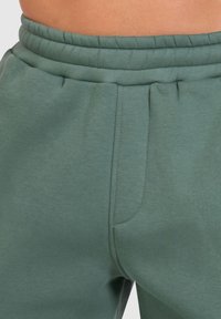 Smilodox CASUAL SPORT FIERO - Trainingsbroek - hellgrün