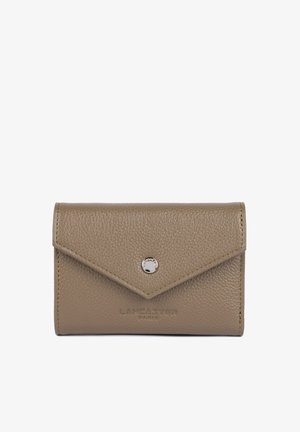 Khaki leather wallet with a textured surface, triangular flap, and silver snap closure. "Lancaster Paris" embossed at the bottom.