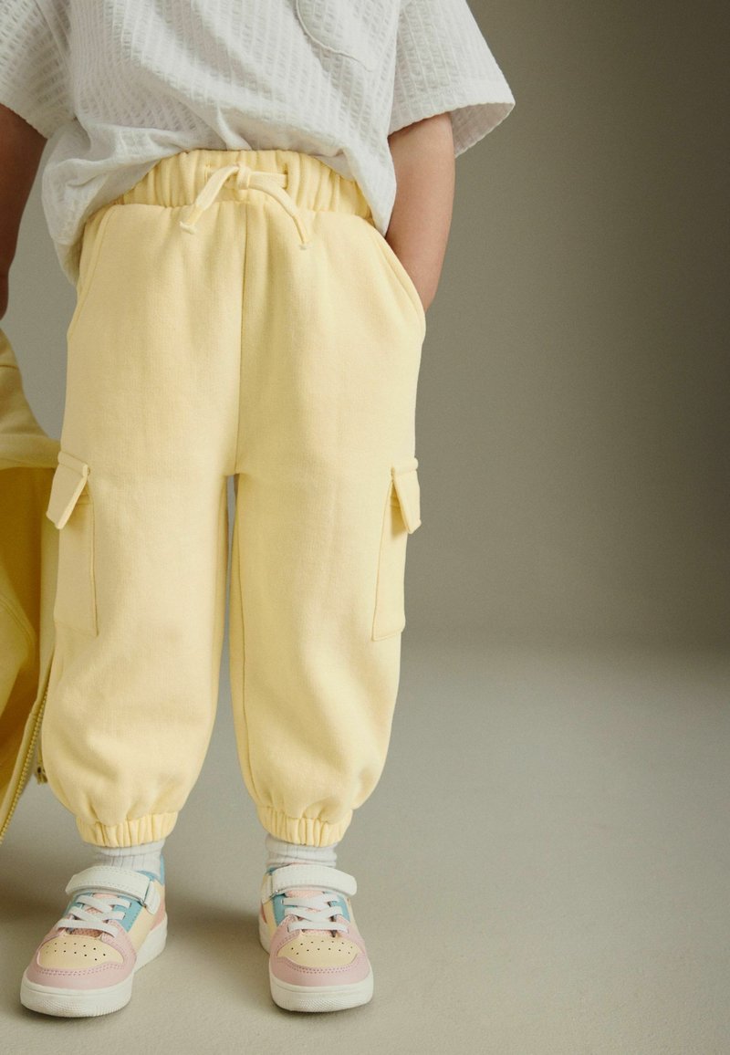 Next Kapsáče - yellow