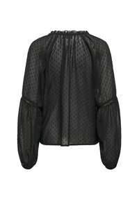 Blouse noire transparente avec manches longues bouffantes, texture à pois, encolure froncée, vue de dos.