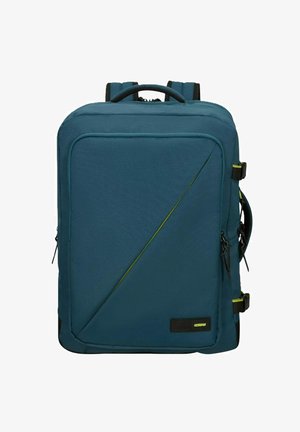 Zaino turchese realizzato in tessuto resistente, caratterizzato da un design geometrico con una linea di accento gialla e doppie cerniere sui lati.