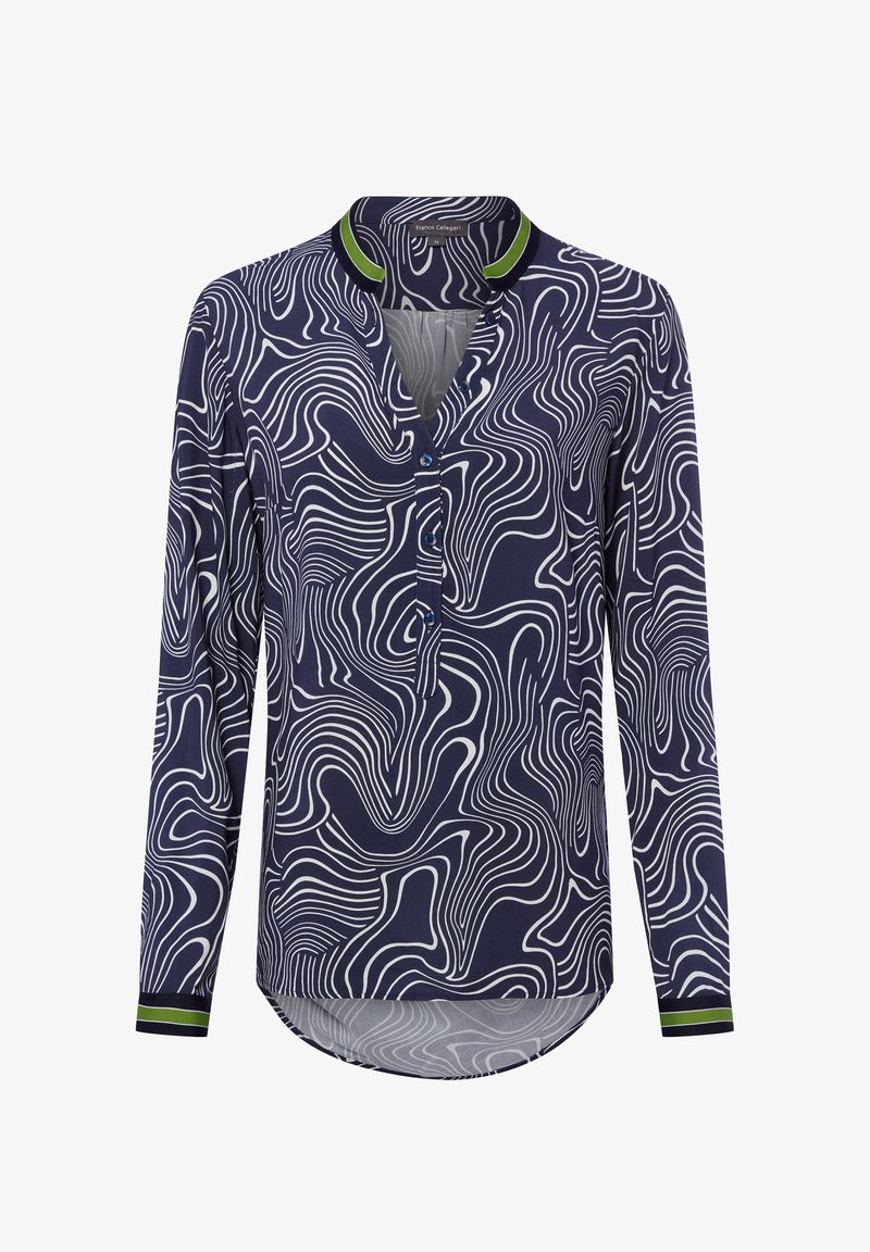 Navy long-sleeve shirt with white wavy pattern, snap placket, and green accent at the collar and cuffs. Soft fabric with a relaxed fit.