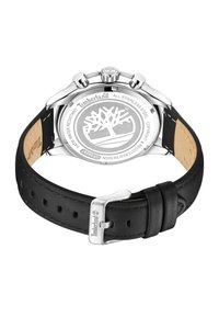 Cinturino in pelle nera con attacchi in acciaio inossidabile, cassa circolare silver, e logo Timberland inciso sul retro con caratteristica di resistenza all'acqua.