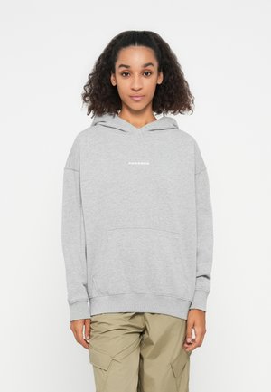 Gray hooded sweatshirt with a front pocket and white "PEGADOR" text. Features a relaxed fit and ribbed cuffs, paired with beige cargo pants.