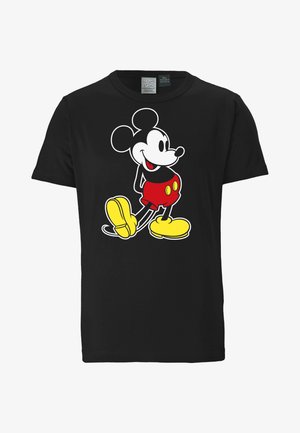 Black t-shirt featuring a graphic of a cartoon mouse with large ears, red shorts, and yellow shoes, outlined in white. Classic design.