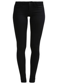 Černé skinny džíny vyrobené z denimové látky. Mají klasický design s pěti kapsami, zapínání na zip s knoflíkem a hladkou texturu.