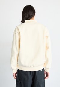 Obey Clothing LOWERCASE - Hosszú ujjú felső - unbleached