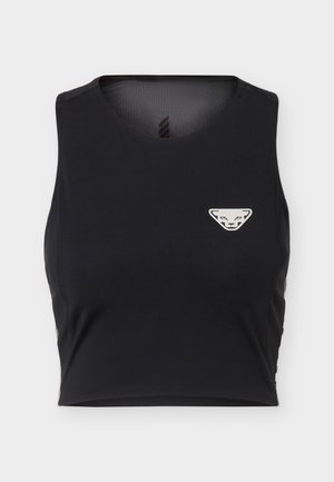 Top court de sport noir sans manches avec un petit logo blanc géométrique représentant un visage d’animal sur le côté gauche de la poitrine.