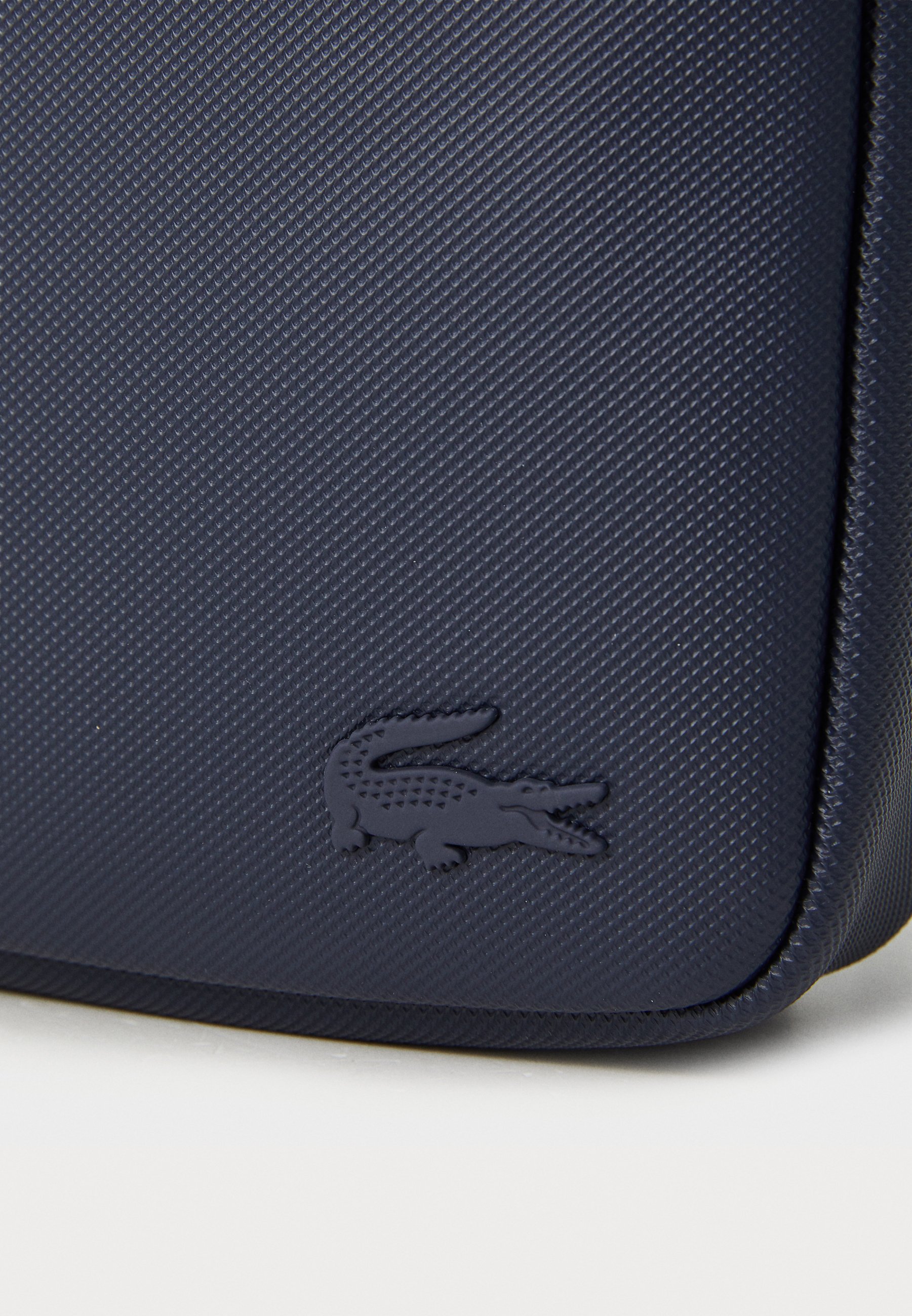Lacoste MEN CLASSIC UNISEX - Cross body bag - marine/dark