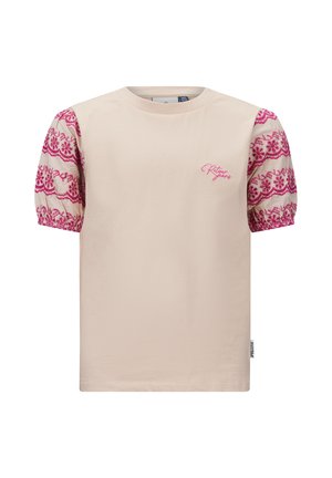 Beige T-Shirt mit kurzen, gepufften Ärmeln aus bedrucktem Fuchsia-Stoff. Mit gesticktem "Return Jeans"-Logo auf der Brust. Baumwollmischung.