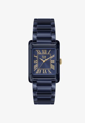 Obdélníkové tmavě modré hodinky s průsvitným řemínkem, zlatými římskými číslicemi, zlatými ručičkami a logem „ice watch“ na ciferníku.