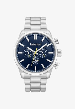 Sølvfarvet metallisk Timberland armbåndsur med blå urskive, tre underskiver, sølvfarvede timeindikatorer samt gul sekundviser og visere til underskiver.