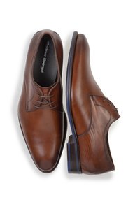 Brown leather shoes with a smooth finish, featuring a rounded toe and a subtle textured design on the side, laced closure, and blue accents.