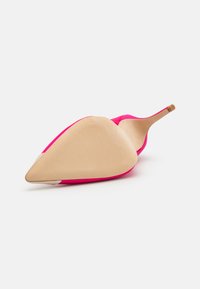 Pink high-heeled shoe with a pointed toe design and a beige sole. The material appears smooth with a solid, bright color. Minimal hardware visible.