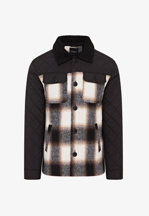 Quilted jacket with black sleeves and collar. Plaid design features white, black, and brown patterns. Button closures and chest pockets.