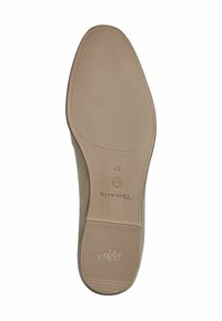 Beige flatesåle laget av gummi med teksturert grep- og hevet merkevarelogo, med et glatt, rundet tådesign.