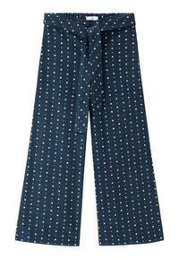 Široke hlače iz modrega blaga z reliefno površino in belimi pikami. Nastavljiv trak na pasu, raven sprednji del in elastična zadnja stran.