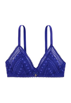 Un bralette en dentelle violette avec une forme triangulaire, des bretelles ajustables, des motifs en diamant délicats et un petit accent en matériel doré au centre.