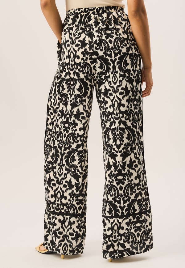 IKAT PRINT WIDE LEG - Trousers - mono2