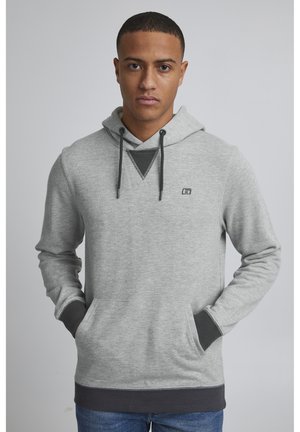 Gray hooded sweatshirt with long sleeves, front pocket, contrasting dark gray accents, and a triangular detail on the chest.