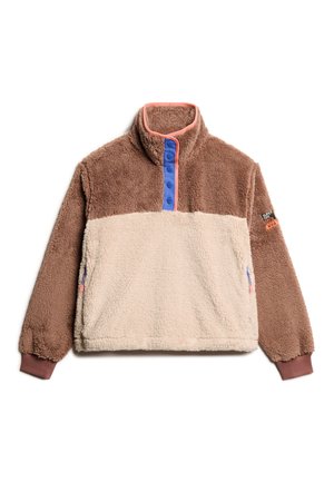 Fleece pullover met een hoge kraag, in bruin en crème kleuren, voorzien van blauwe drukknoopjes en zijzakken, gestructureerde stof en geribde mouwen.
