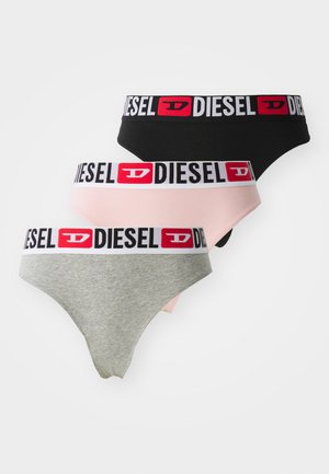 Soutien-gorge de sport noir et culotte assortie avec un logo Diesel audacieux en blanc et rouge sur l'élastique. Tissu lisse et extensible avec un design simple.
