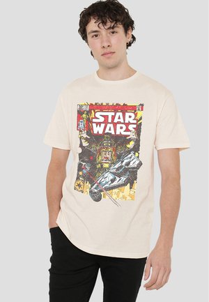 Beige cotton t-shirt featuring a colorful Star Wars graphic print, showcasing characters in a comic book style with bold colors and details.