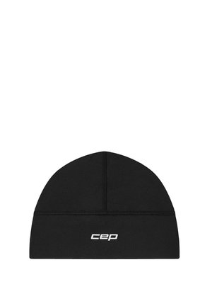 Young man wearing a fitted black long-sleeve shirt and a black beanie with the logo "cep" on both items.