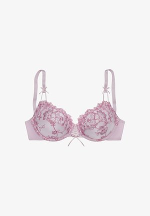 Lichtroze onderwire bh met bloemenkant details, golvende randen en satijnen banden. Heeft een strikaccent tussen de cups.