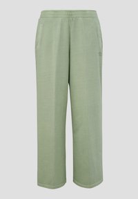 Hellgrüne, lässig geschnittene Hose aus weichem Stoff mit einem elastischen Bund und zwei Seitentaschen. Einfaches Design ohne Muster.