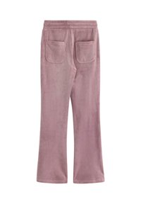 Vaaleanpunaiset velour-flare-housut, joissa on pehmeä pinta. Housuissa on kaksi takataskua ja leveä vyötärönauha, jossa on ompeluyksityiskohtia.