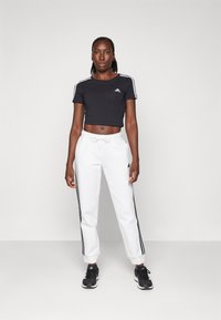 adidas Sportswear Donji dijelovi trenirke - white