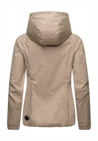 Beige, lightweight jacket with a hood and elastic cuffs. Features a smooth, water-resistant fabric and a logo patch near the hem.