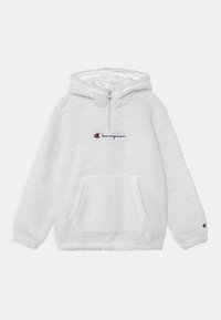 Felpa bianca di pile con tasca frontale, mezza zip, cappuccio con cordini e logo "Champion" ricamato in blu e rosso. Tessuto morbido e texturizzato.