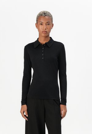 Black long-sleeve polo shirt with a collared neckline, five-button placket, and fitted design. Made of smooth, stretchy material.