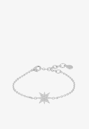 Silverkedja armband med en stjärnformad berlock prydd med klara ädelstenar. Inkluderar en säker låsning och justerbar längd.