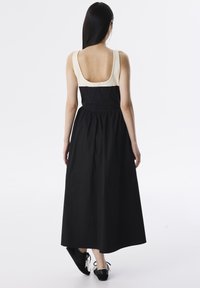 Twist COLORBLOCK MIDI - Vestito casual - black