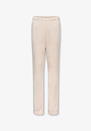 Pantalons de jogging en polaire couleur crème avec taille et poignets élastiques, présentés sur un fond blanc.