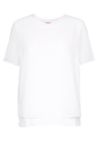 T-shirt blanc à manches courtes avec col rond, présentant un ourlet arrière légèrement plus long et un tissu lisse et léger. Sans motifs ni accents.