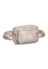 Light beige crossbody bag made of smooth nylon, featuring two zippered compartments, a decorative charm, and a woven strap.