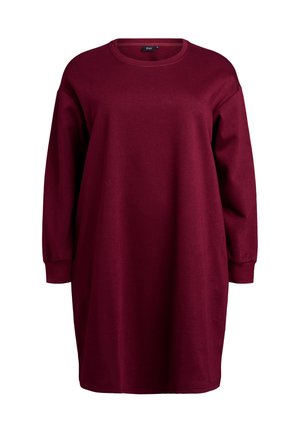 Abito maglione oversized bordeaux con maniche lunghe, scollatura rotonda e texture morbida, caratterizzato da una vestibilità comoda e dettagli minimi.