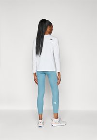 The North Face FLEX 25IN TIGHT - Leggings - algae blue