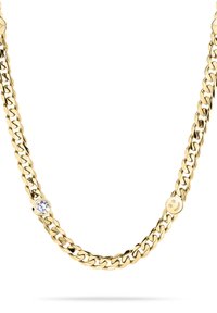 Gouden ketting met grote schakels, een enkele heldere edelsteenaccent en een klein glimlachend gezicht detail op één schakel.