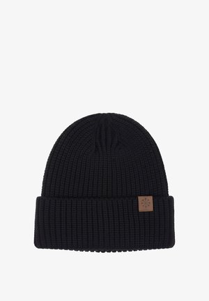 Schwarze Mütze aus Rippenstrick mit umgeschlagenem Bündchen und einem kleinen braunen Lederpatch mit Schneeflockendesign. Weiche Textur und anliegende Form.