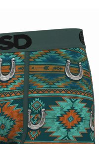 Mutande boxer con un motivo geometrico turchese, arancione e marrone. Accenti a ferro di cavallo argentati posizionati sul tessuto vicino alla fascia in vita.