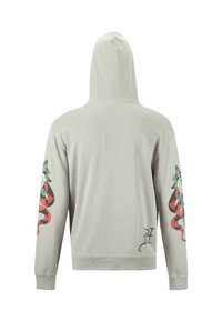 Sudadera gris clara con capucha. Presenta diseños coloridos de flores y serpientes en las mangas y un pequeño logo en la parte baja de la espalda. Material de algodón.
