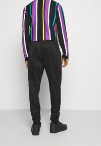 Ellesse Träningsbyxor - black