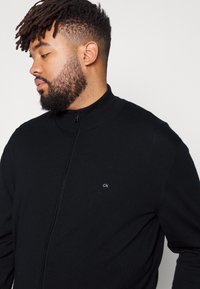 Calvin Klein SUPERIOR ZIP THRU JACKET - Casaco de malha - black