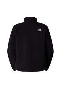 Svart fleecejacka med hög krage, mjuk textur och en liten vit logotyp på övre ryggen. Har rak avslutning och långa ärmar.