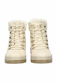 Stivali alla caviglia in suede beige con colletto in pelliccia sintetica, occhielli dorati e lacci beige. Suola in gomma spessa con battistrada decorato per una migliore aderenza.